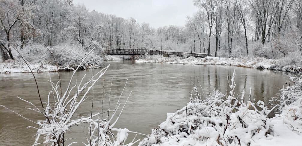 A beautiful, snow-covered Mt. Pleasant City Park in the winter, featuring the chippewa river and bridge; Photo credit: Instagram fan @maeganmlk