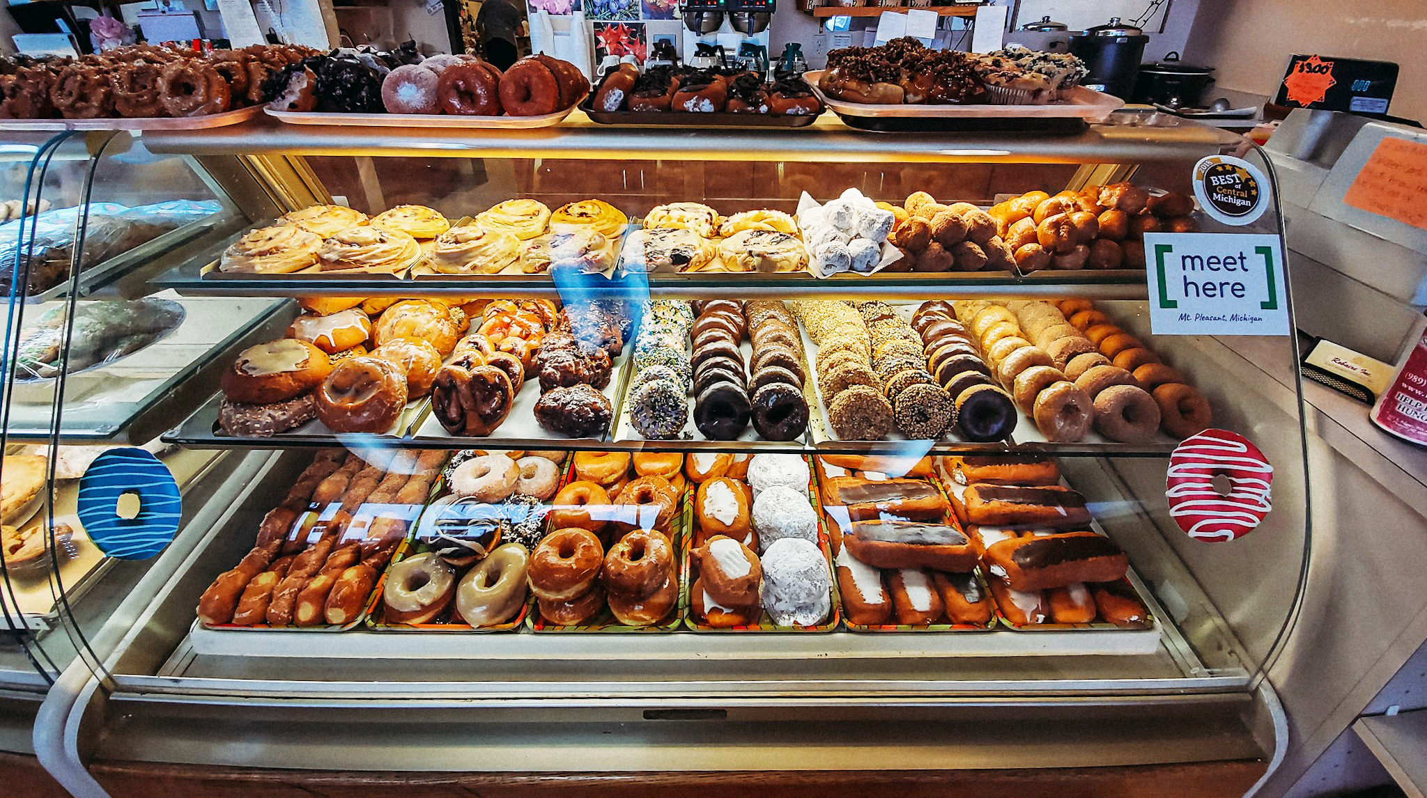 Robaire's Bakery, a locally-owned bake shop's display of homemade doughnuts, cinnamon rolls, breads and more in Mt. Pleasant, Michigan.